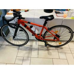 Koersfiets kind triban100 btwin