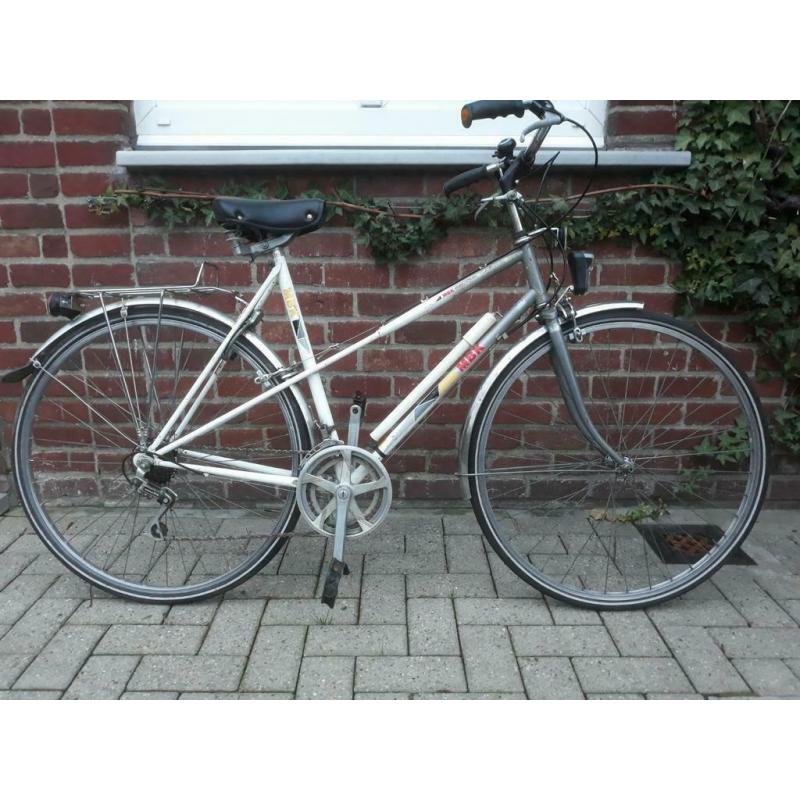 Vélo femme Mbk avec 12 vitesses en bon état